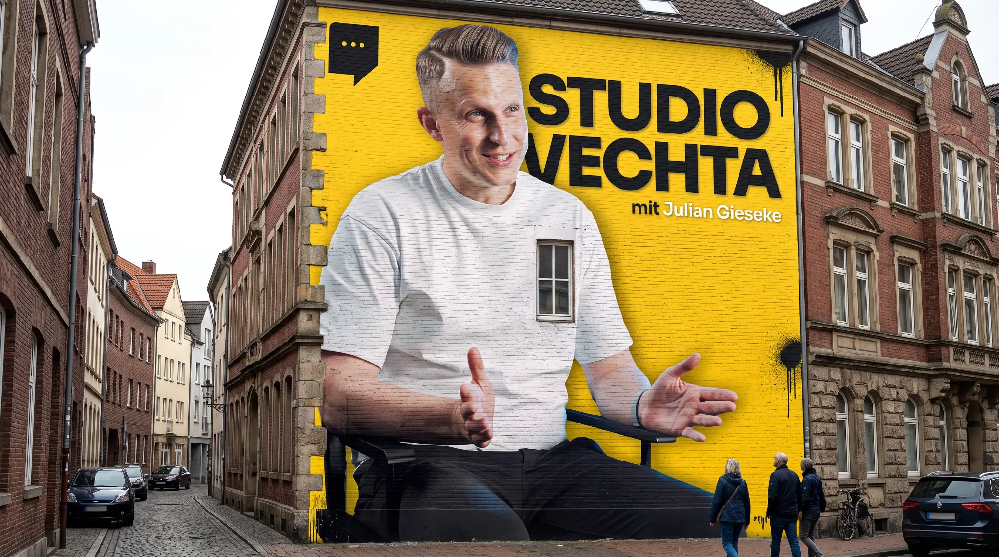 Großes gelbes Studio-Vechta-Mural mit Julian Gieseke an einer Hausfassade